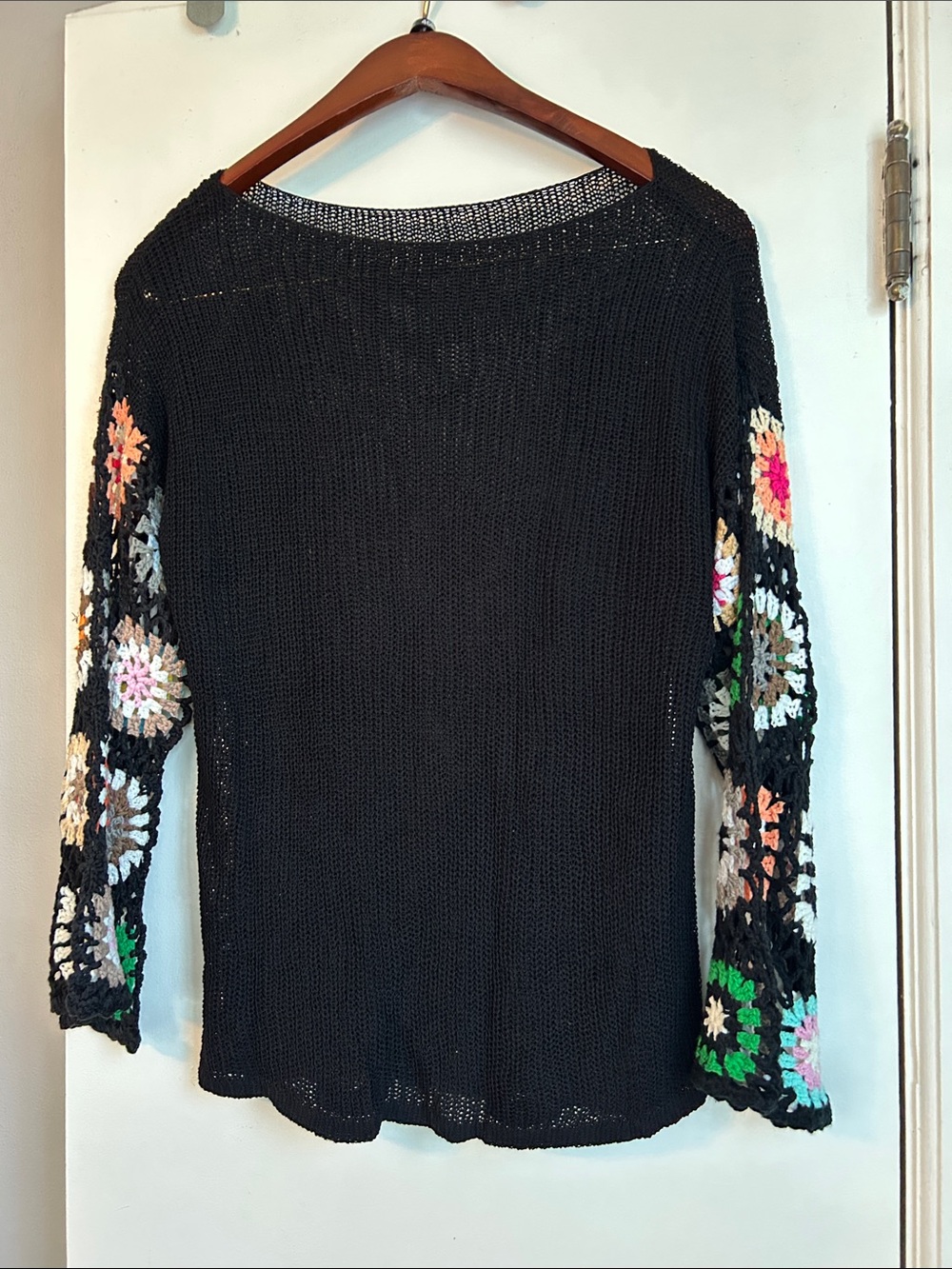 Black Crochet-Sleeve Knit Sweater with Multicolor Floral Accents
